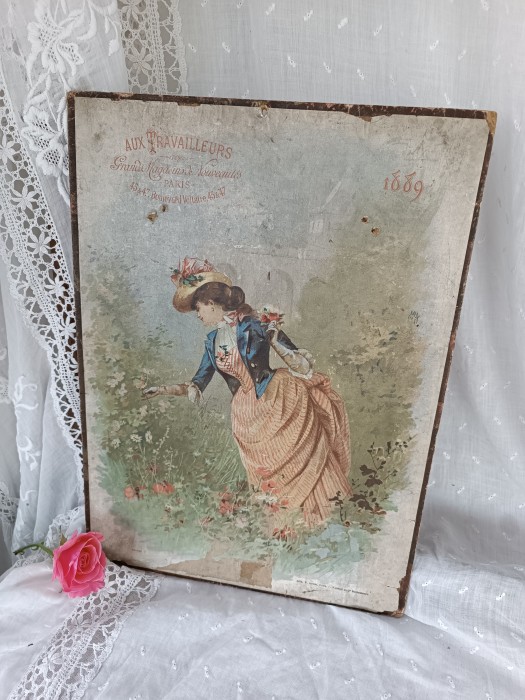 French Brocante - For Sale - 1889 advertising calendar card poster Description: <p>These advertising calendars were a popular end of year gift for customers of the grand magasins and boutiques, in fact it is still quite common in France to walk into a local shop and be given a free calendar</p>

<p>Attached to the card poster would have been a tear off paper sheet pad with the dates on, which by it's nature has been used and torn off leaving a bit of damage behind but most of the main picture is intact if a little timeworn and with some puncture holes</p>

<p>On the back is all the information about the retailer and the saints days calendar</p>

<p>Measures 37cm by 27cm </p>
