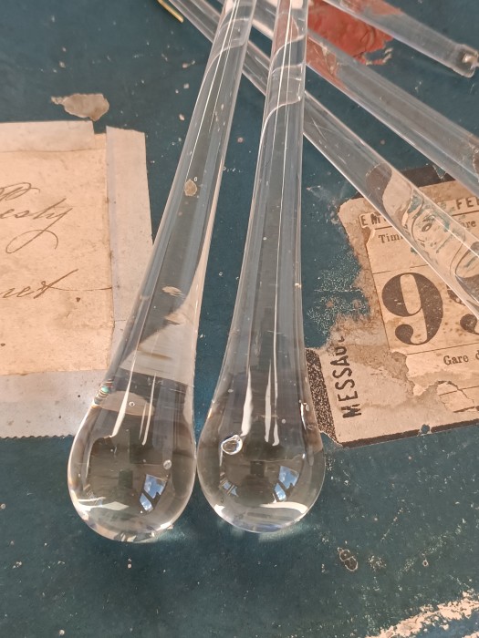French Brocante - For Sale - Antique Crystal Drops from a Chandelier Description: <p>Beautiful long teardrop lead crystal glass drops from an antique chandelier measuring 16cm long</p>

<p>All in perfect condition most still with the hanging wire </p>
