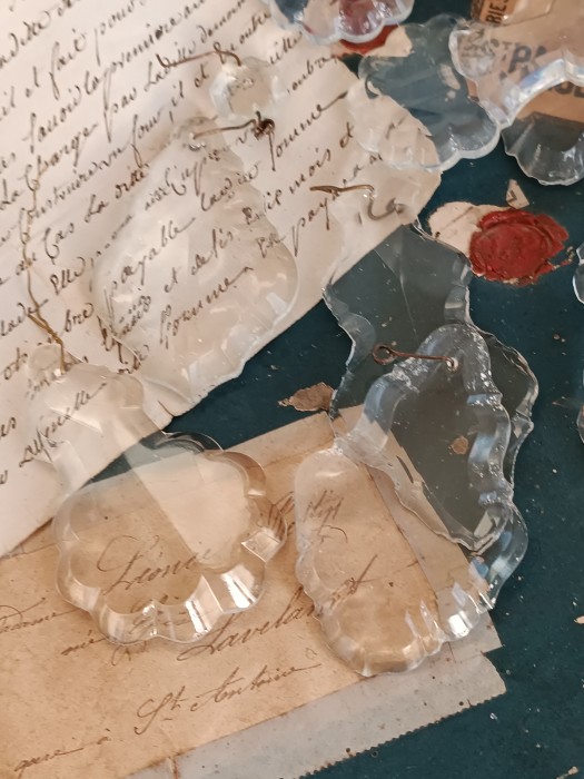 French Brocante - For Sale - Antique Medium Crystal Drops from a Chandelier Description: <p>Flat back lead crystal glass pampilles from an antique chandelier with faceted sides great for backing with old papers to make hanging decorations</p>

<p>8cm long, there are some slight differences if you are reserving several you may get a mix </p>
