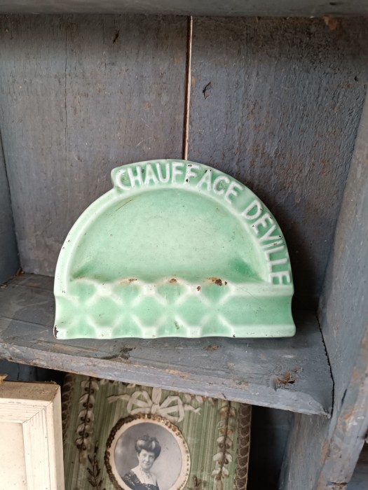 French Brocante - For Sale - Cast Iron Enamel Advertising Ashtray, Trinket DishDescription: <p>Chauffage Deville advertising dish, obviously an ashtray but would make a sweet trinket vide poche, Deville make wood burning stoves</p>

<p>The gorgeous green colour suggests 1920's as does the shaping</p>

<p>Quite heavy it has the wonderful chalky thick enamel you only see on antique enamel on cast iron</p>

<p>11cm across</p>
