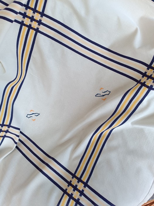 French Brocante - For Sale - Traditional Basque Stripe TableclothDescription: <p>Classic vintage 1920's/30's striped cloth, typical of Basque textiles</p>

<p>Light diamond weave damask with the yellow and indigo blue stripe woven into the cloth not printed on</p>

<p>This one has two C monograms embroidered by hand in matching yellow and blue</p>

<p>It has had a life but is still in good condition to use, also good amount of fabric to repurpose, 115cm by 112cm </p>

<p> </p>
