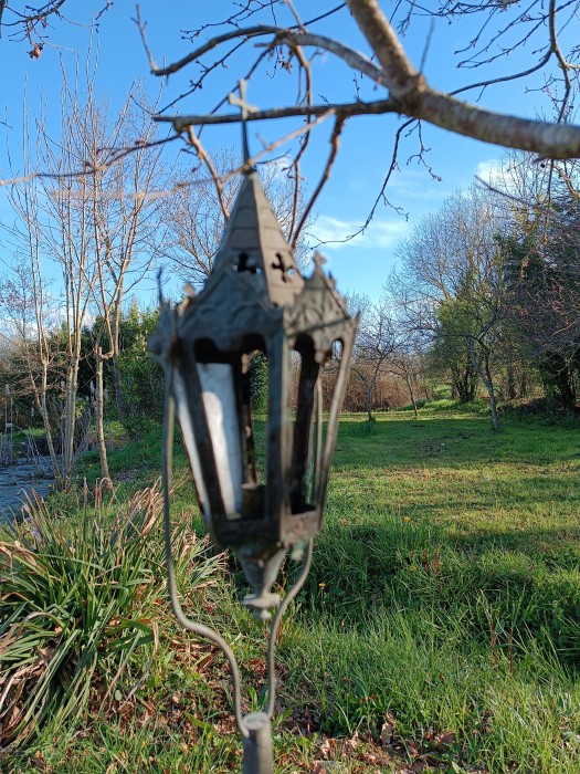 French Brocante - For Sale - Antique Church Religious Processional CandleholderDescription: <p>Late 1800's gothic style metal candle lantern was made for use in religious processions and events and would have been attached to a pole for carrying so it swung as you walked.</p>

<p>A bit battered and timeworn, perfect for a romantic shabby chic décor, it has a candle holder in the centre and would have had 6 of the frosted glass panels with the cross emblems, only two remain</p>

<p>The lantern part measure 38cm to the top of the crucifix, not including the swinging mount</p>

<p>Apologies, the photos could be better</p>
