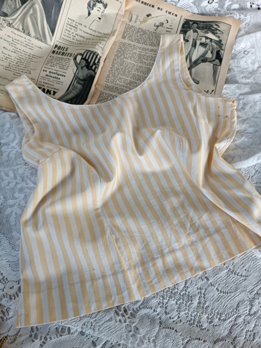 French Brocante - For Sale - True Vintage Summer TopDescription: <p>Simple vest style top in yellow and white stripe cotton, some tailoring to give shape at the front</p>

<p>chest 34"</p>

<p>some rust spots and a little damage under one arm</p>

