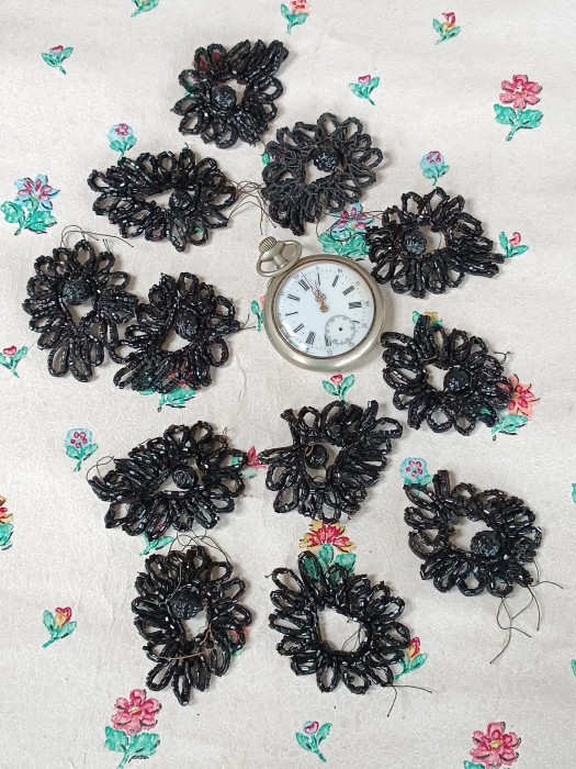 French Brocante - For Sale - 12 Small French Jet Beaded Appliques, #3Description: <p>There are 12 of these appliques, flower shapes with a large central bead, a few stray threads and one applique has lost its central bead</p>

<p>6cm long</p>
