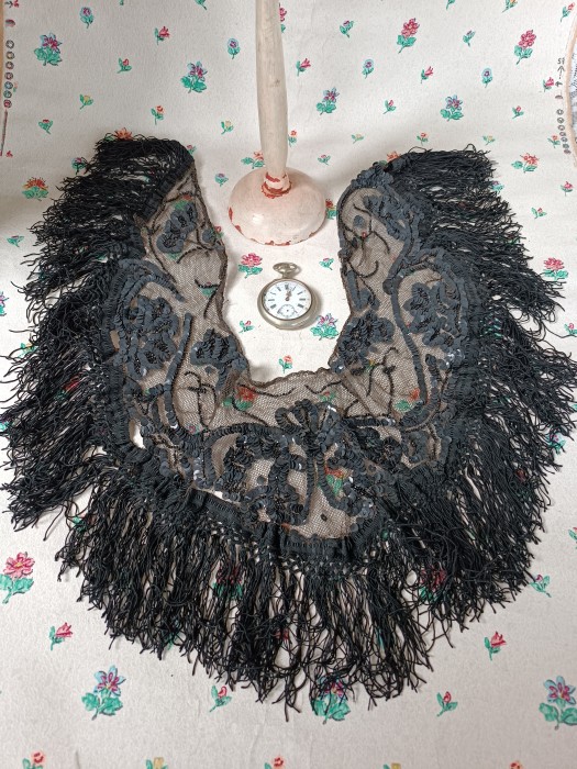 French Brocante - For Sale - Sequin & Beaded Tulle Lace CollarDescription: <p>Late 1800's striking lace collar decorated with metallic sequins and small jet beads and finished with a silk fringe.</p>

<p>In good antique condition, the ground has faded to an antique black, and a stitch or two is nedded to tack parts of the fringe back on</p>
