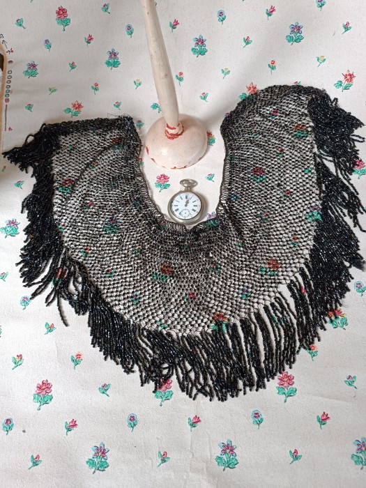 French Brocante - For Sale - 1800's Heavy Jet Bead Fringed CollarDescription: <p>A beauty, this threaded jet bead collar with long beaded fringe is incredibly heavy and feels amazing draped over your shoulders. I cannot see any losses which given its large size is remarkable.</p>

<p>Weighs 280g</p>
