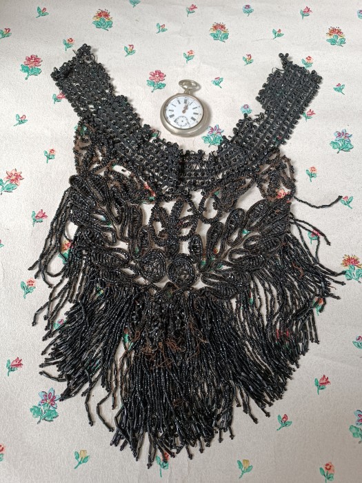 French Brocante - For Sale - Victorian Jet Bead Collar #3Description: <p>A large and heavy jet bead decorative collar from the 1800's with a classic Victorian high neck, a remarkable costume accessory.</p>

<p>There is some damage on the neck which with repair would not detract, and centre front some loose threads need tidying</p>
