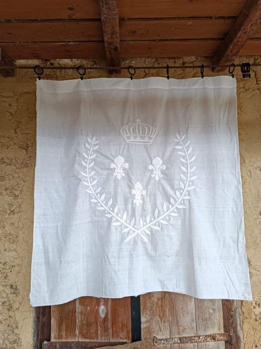 French Brocante - For Sale - Embroidered Aristocrat Panel Description: <p>I don't believe I have ever seen anything as wonderful as this white stump work embroidery panel, I believe that is a Duke's crown, along with&nbsp;the Fleur de Lys adding to the symbols of French aristocracy,&nbsp;sewn with thread in multiple directions to give that raised three dimensional effect, it is all hand sewn on a fine cotton that hangs well and is in excellent condition, a couple of tiny holes and you can see one of the Fleur de Lys is fraying, a unique decorative antique textile 105cm/41" square</p>

<p>&nbsp;</p>
