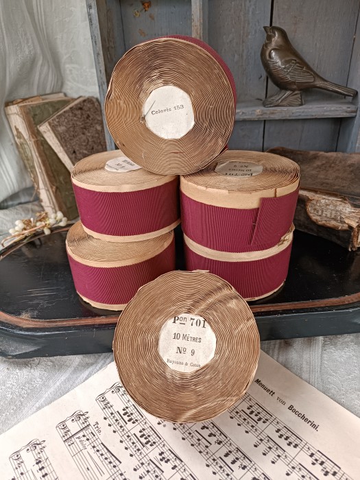 French Brocante - For Sale - Vintage Grosgrain Hat Ribbon Description: <p>I have a number of unused rolls of wine red vintage grosgrain hat ribbon, a blend of cotton and rayon, 10 meters each roll, 4.5cm wide</p>

<p>Dead stock so in good condition&nbsp;</p>

<p>4&nbsp;available</p>

<p>&nbsp;</p>
