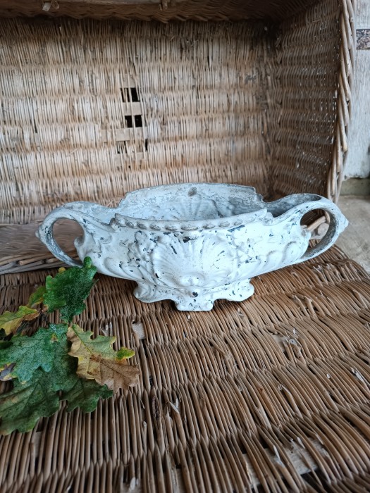 French Brocante - For Sale - 19thc Cast Iron Jardiniere Description: <p>A very attractive antique 19th century cast iron jardiniere, the original weathered chippy white enamel paint would suit a monochrome shabby chic decor, I think the look is perfect, these are usually too big and heavy for me to consider shipping but this is small and perfect for slipping in a small parcel weighing only 2.5kg, 14" wide</p>

<p>&nbsp;</p>
