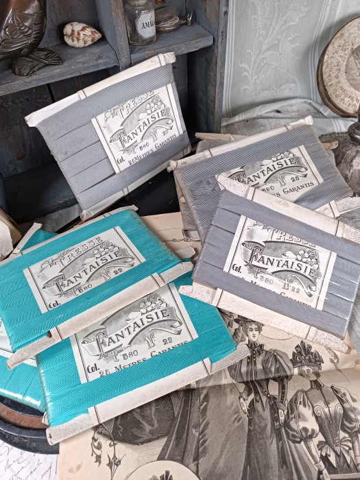 French Brocante - For Sale - Vintage Tresse Ribbons Description: <p>From that treasure trove mercerie shop haul&nbsp;these gorgeous Tresse ribbons have&nbsp;a fine textured weave, the sort of trims you might find as laces for tap or ballet shoes, maybe straps on lingerie, or for sewing/embroidery projects, the ribbon is 2cm wide, each pack has 25 meters, all have their cellophane wrapper except for one silver one, great condition to use&nbsp;</p>

<p>Price is per pack</p>

<p>Silver grey&nbsp;- 5&nbsp;available&nbsp;<br />
Turquoise -&nbsp;3 available&nbsp;<br />
&nbsp;</p>
