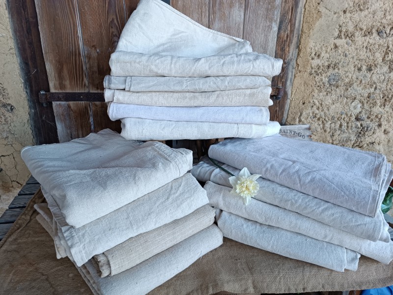 French Brocante - For Sale - 19thc Hand Loomed Hemp Sheets Description: <p>These used to be a Brocante staple, now they are a find to get excited about as they become rarer, hemp was grown in the countryside, loomed on the farm and made into clothing, textiles for the house and for use in farming and food production.</p>

<p>These sheets have a variety of natural colours, superb textures, and those&nbsp;hand made qualities you can only find in antique textiles.</p>

<p>Because this was a small cottage industry production was on small scale looms, as a result these sheets have a hand sewn flat seam joining two loom widths together.</p>

<p>They are extremely versatile, ideal for dividing into two for making curtains, great for upholstery, to use as throws, bedcovers or making into cushions,bags aprons etc</p>

<p>In the last photos I have numbered the pile so you can message me with you choice of shade and texture&nbsp;</p>

<p>Sheets 7,8,9,11,12 and 13 SOLD</p>
