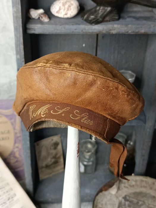 French Brocante - For Sale - Miniature Doll's Sailor's Cap Description: <p>This doll or teddy's leather hat&nbsp;in the form of a sailor's cap is made from a soft leather with the headband decorated with gold lettering that says HMS Star, the quality of the materials and the attention to detail suggests this was from an expensive toy and definitely antique, perhaps a souvenir item, there was a name printed on the inner lining but it is impossible to read now</p>
