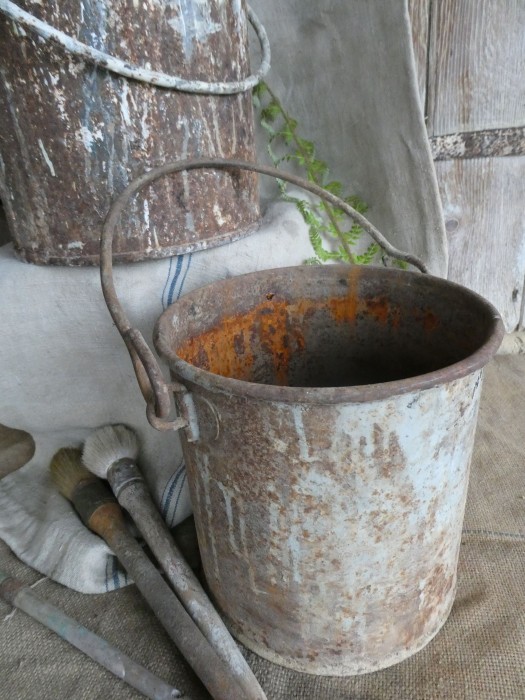 French Brocante - For Sale - Small Timeworn Galvanised Paint KettleDescription: <p>Decorators galvanised paint kettle, battered and rusty, perfect patina for displaying a collection of old worn paintbrushes</p>
