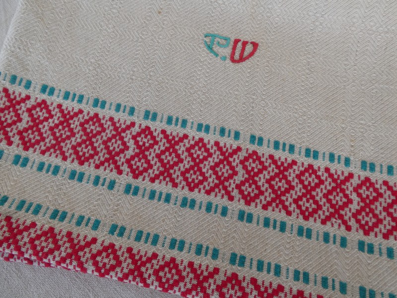 French Brocante - For Sale - Vintage Red and Green Woven Basque tablecloth Description: <p>We are lucky to live very close to the Basque country and the famous textiles they produce sometimes appear at Brocantes with their traditional pattern weave and bright colour combinations</p>

<p>This one dates from the 1920s/30's, has a green and red colour woven border, classic Basque colours and a traditional patterned weave</p>

<p>Difficult to assess the exact fibre, cotton blend, perhaps with hemp running through the weave as there's a slight contrast in the pattern</p>

<p> It has been laundered, there is a slight fold storage mark remaining which will disappear with additional washing</p>

<p>Measures 108cm by 103cm</p>

<p>  </p>
