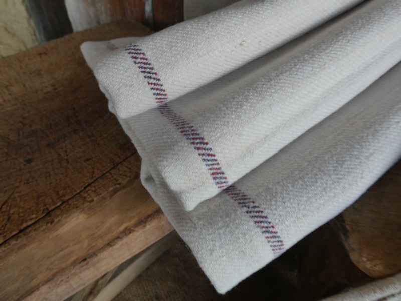 French Brocante - For Sale - Pair of Superb Large Hemp ClothsDescription: <p>I have a passion for antique home or farm spun hemp, clothing, linens and an addiction to buying torchons</p>

<p>This pair of extra large cloths are thick heavy early 20thc hemp linen, hand loomed with an unusual stripe woven in red and indigo blue thread at both ends. The texture is delicious, with imperfections and flecks of raw hemp visible</p>

<p>They are in good condition but need a soak and launder to remove storage marks along folds where they have been left in an armoire for years</p>

<p>93cm by 86cm</p>

<p>Price is for the pair</p>
